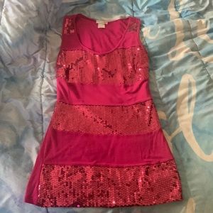 This is a long pink tank top with sequins that reminds me of Barbie! :)